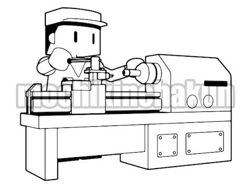 旋盤装置で切削加工する作業員